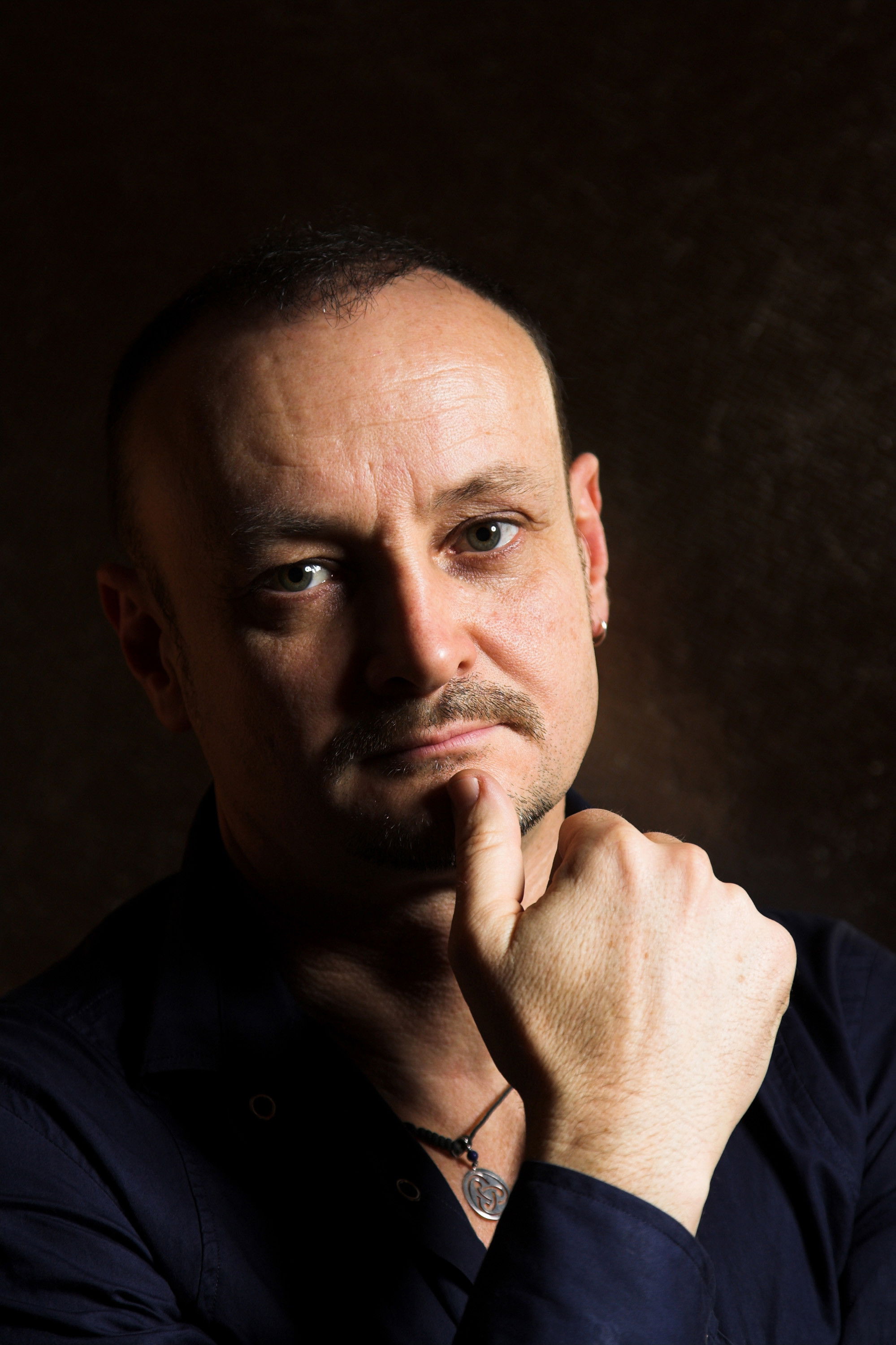 Marco S. Puccioni backdrop