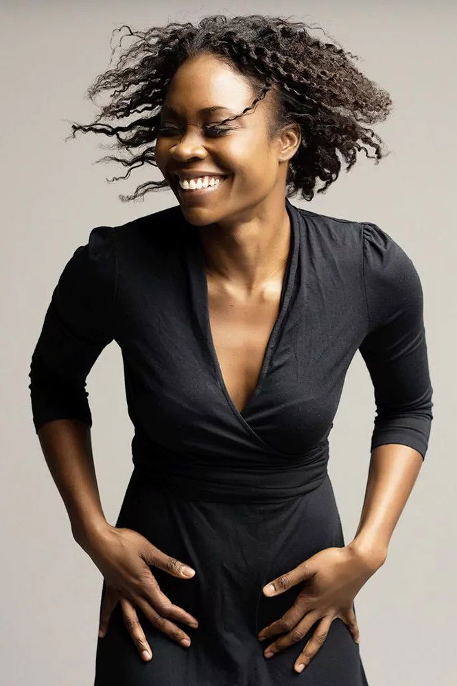 Jeanine De Bique backdrop