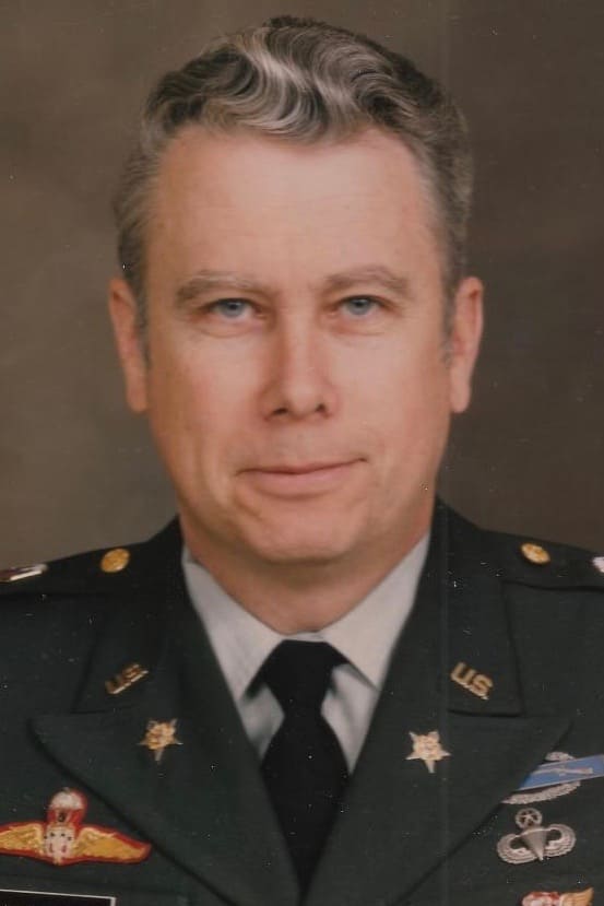 John B. Alexander backdrop