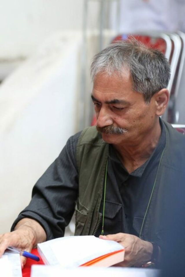 Aboutorab Khosravi backdrop