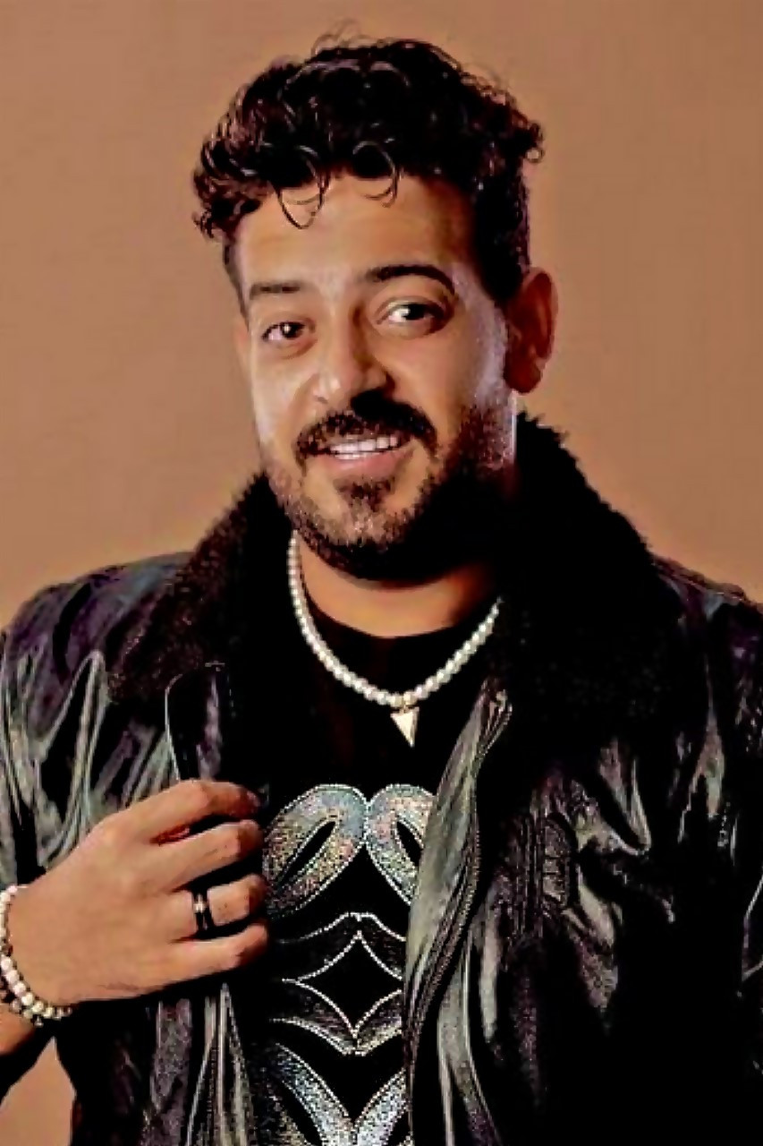 Ismail Ellithy backdrop