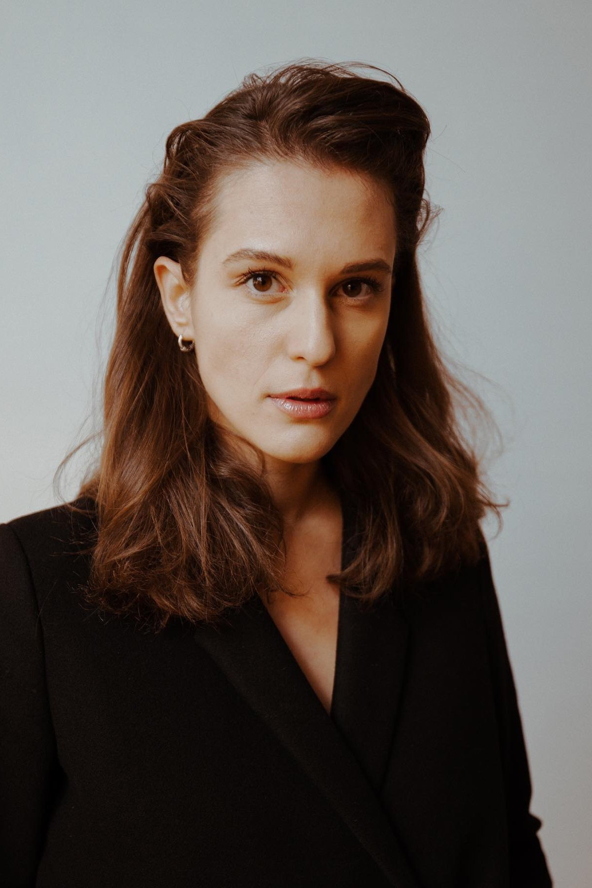 Rina Krasniqi backdrop