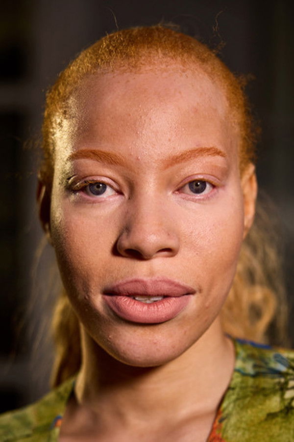 Latifa Mwazi backdrop