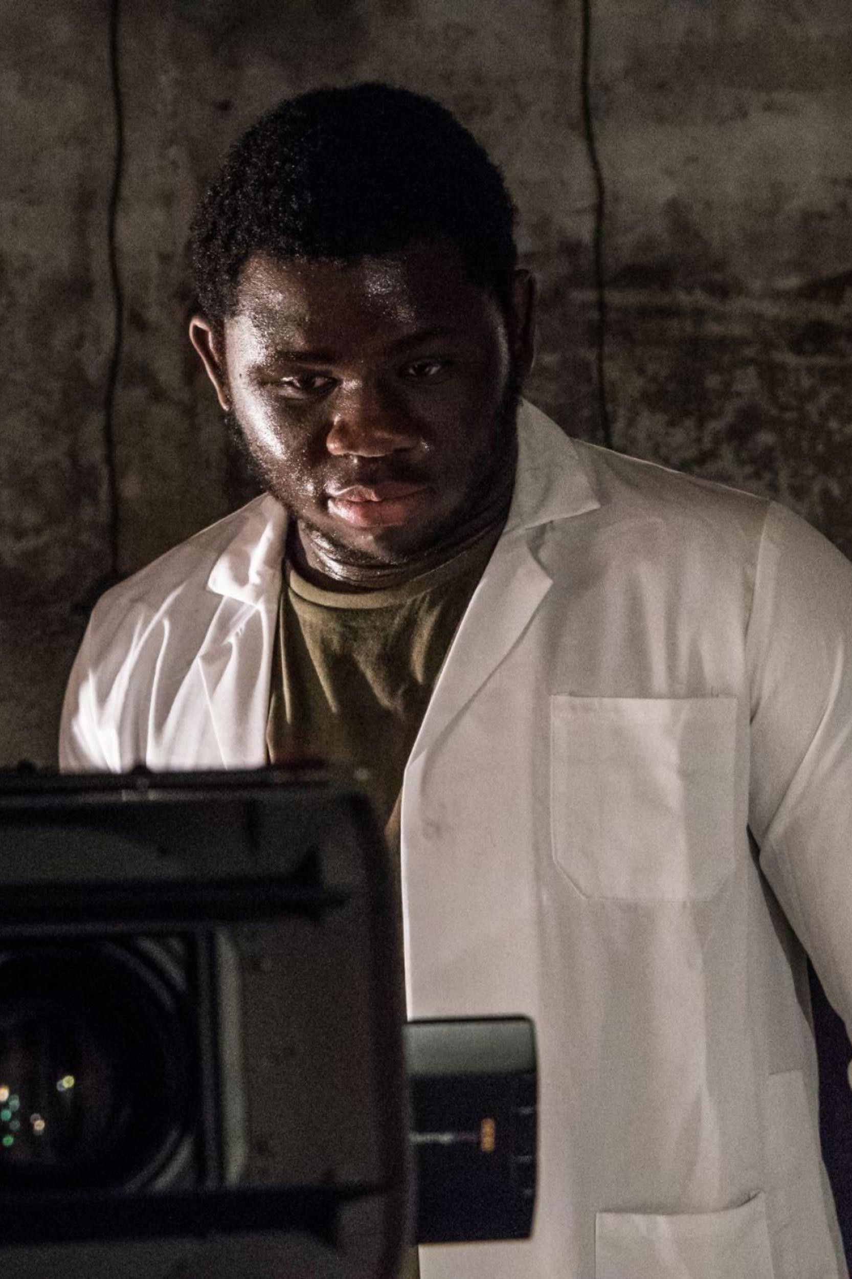 Charles Mugoya backdrop