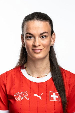 Riola Xhemaili backdrop