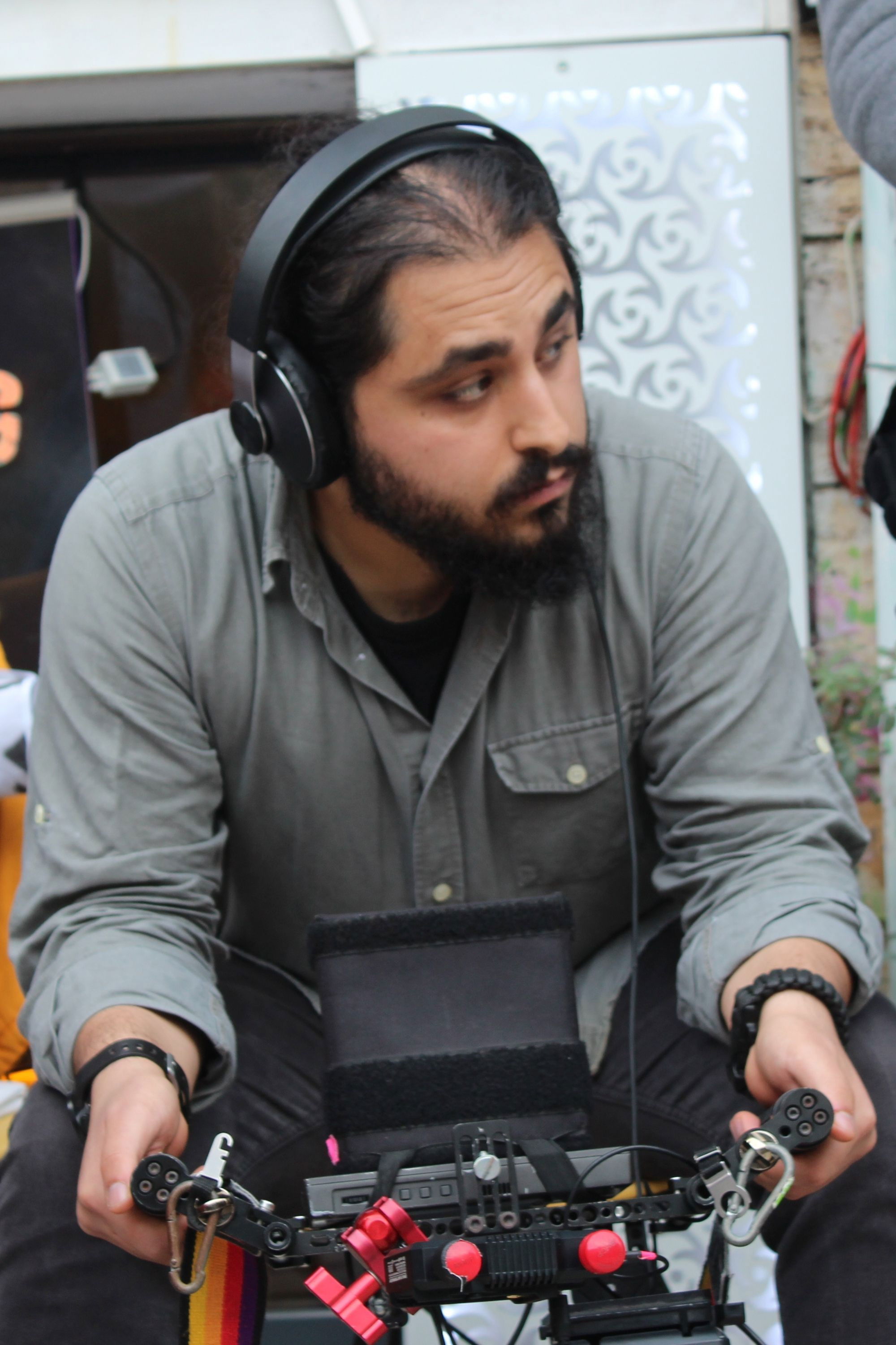 Ali Aytaç Mehmetoğlu backdrop