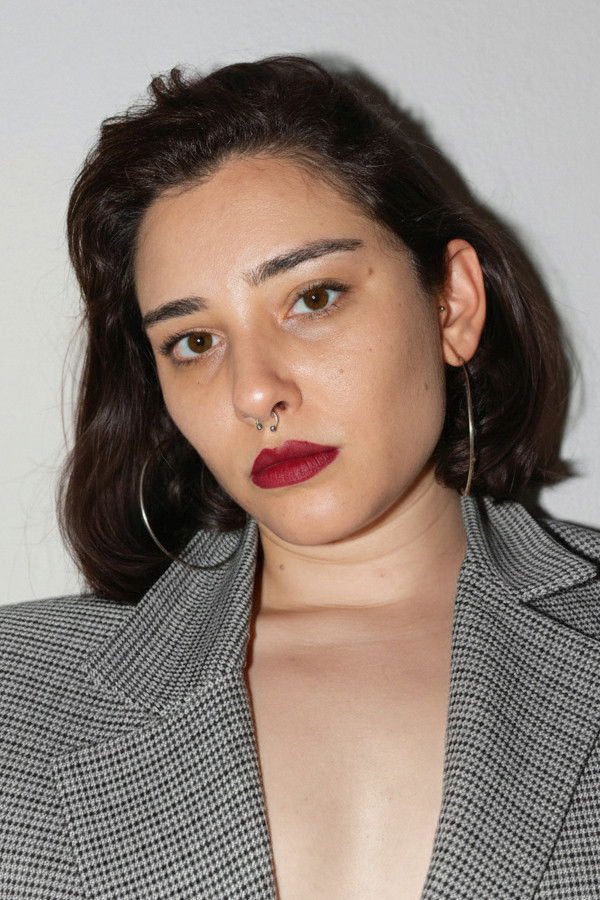 Kumru Karataş backdrop