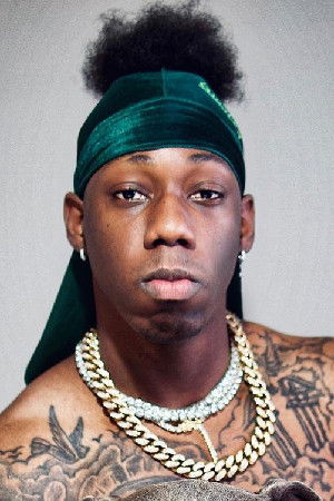 Malcolm Minikon backdrop