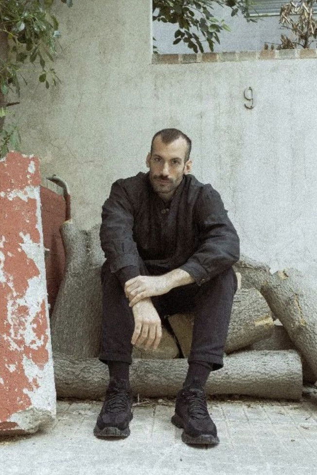 Giorgos Athanasiou backdrop