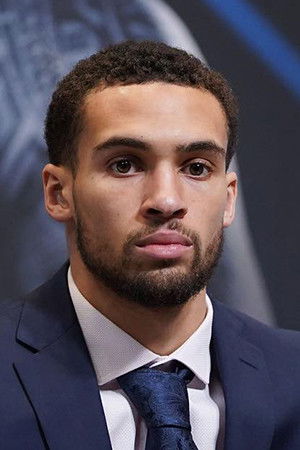 Karol Itauma backdrop