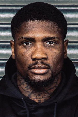 Mikael Lawal backdrop