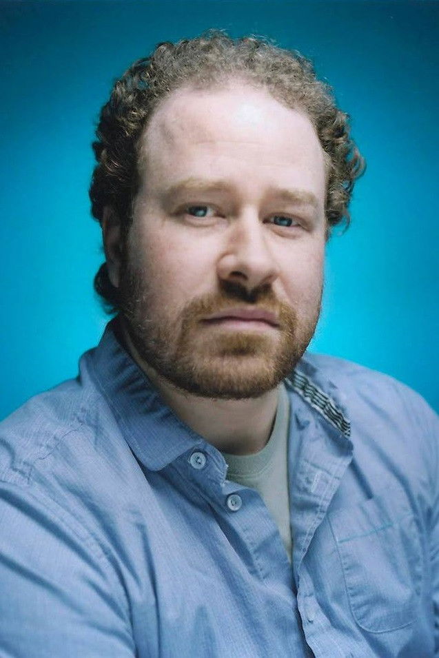 Patrick T. Rousseau backdrop