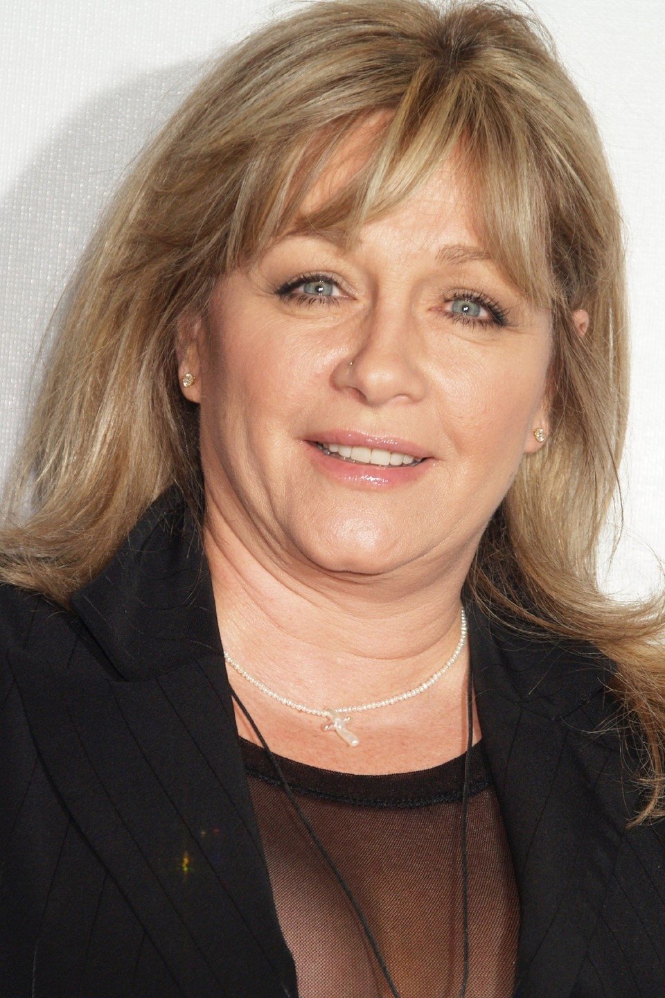 Patti D'Arbanville backdrop