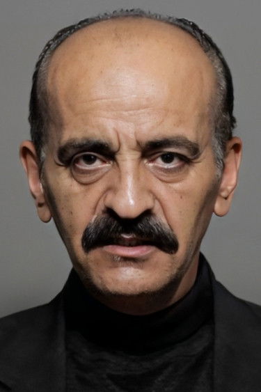 Remzi Özgüllü backdrop