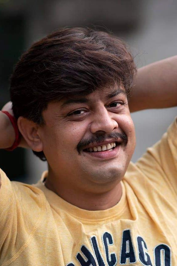 Dhiman Bhattacharjee backdrop