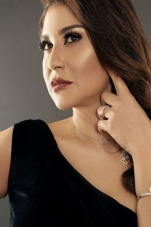 إنجي شرف backdrop