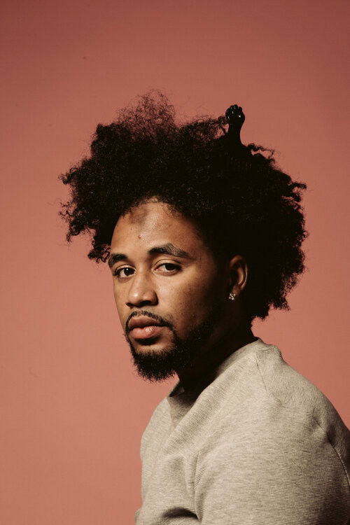 Dein-Rene Amazan backdrop