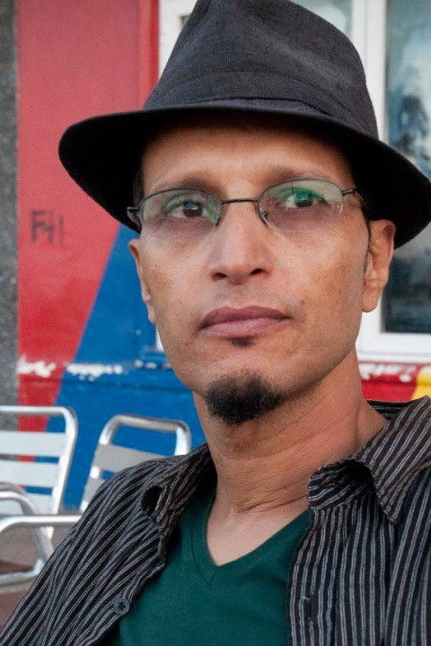 Abdelhadi El Rharbi backdrop