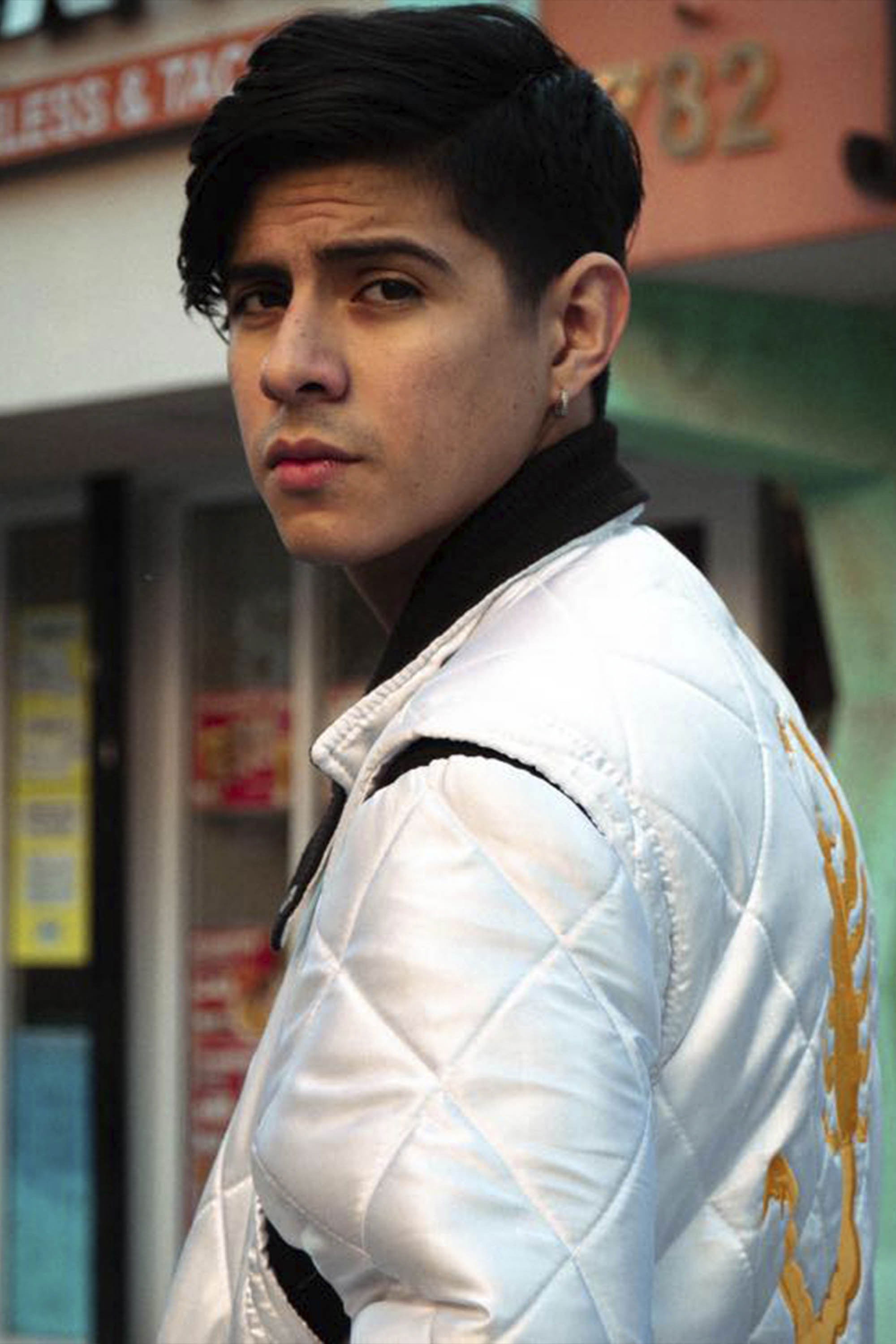 Manuel Santillán backdrop