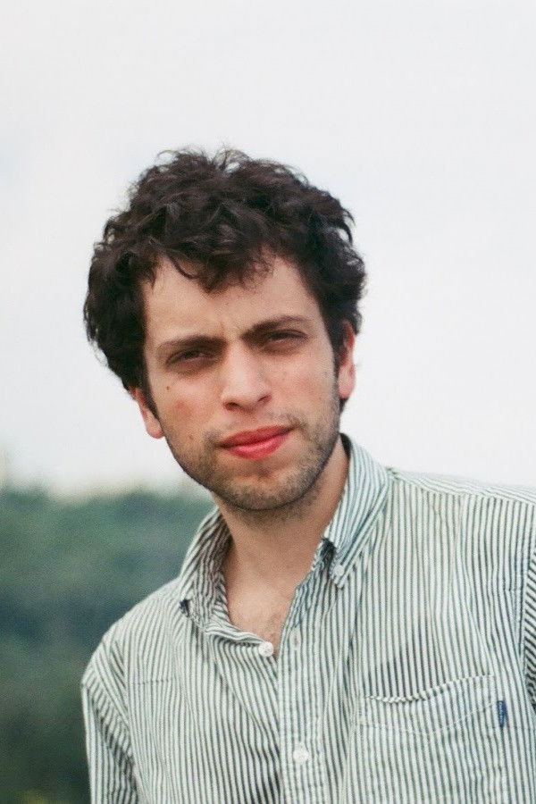 Nicholas Nazmi backdrop