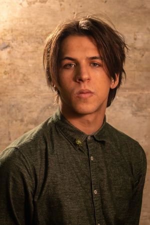 Nandê Caetano backdrop