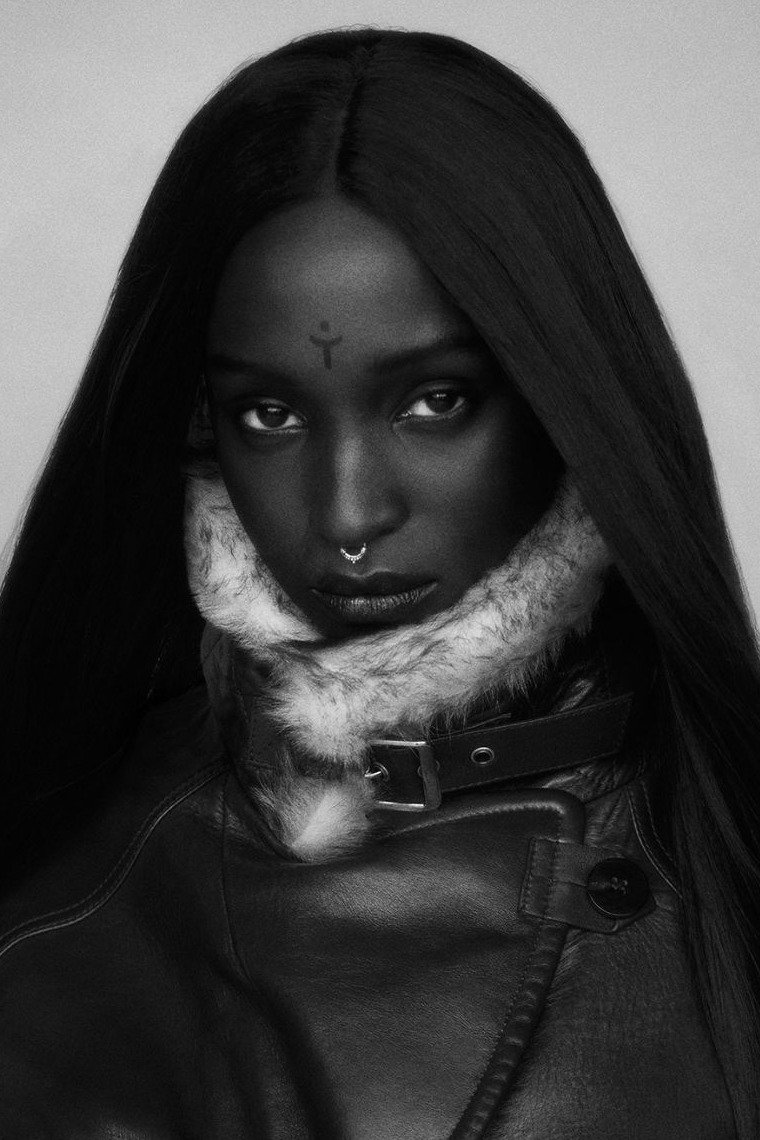 Marie Pierra Kakoma backdrop