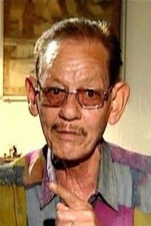 Kamal El Hummusany backdrop