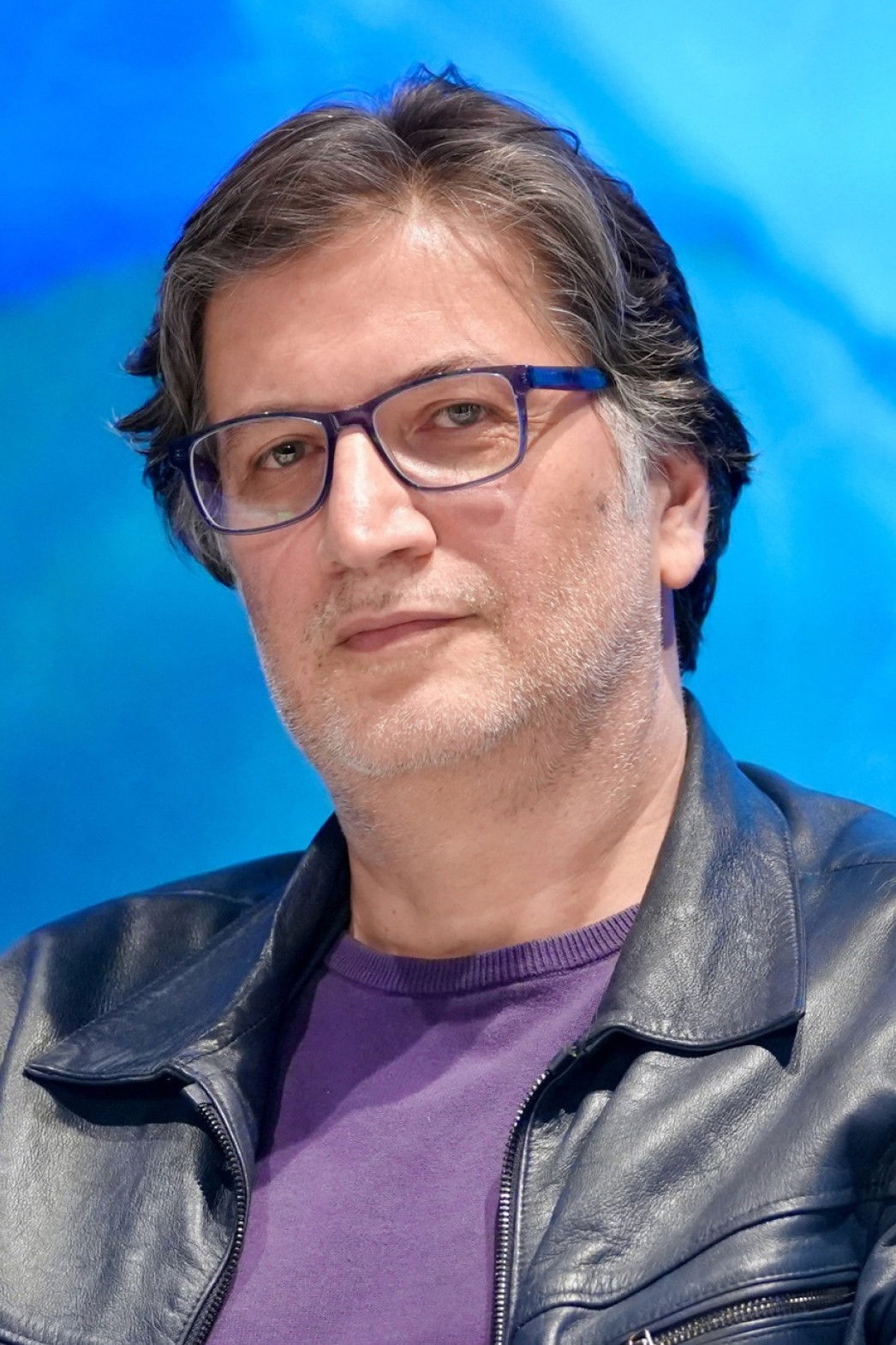 Mohamed Kheirandish backdrop