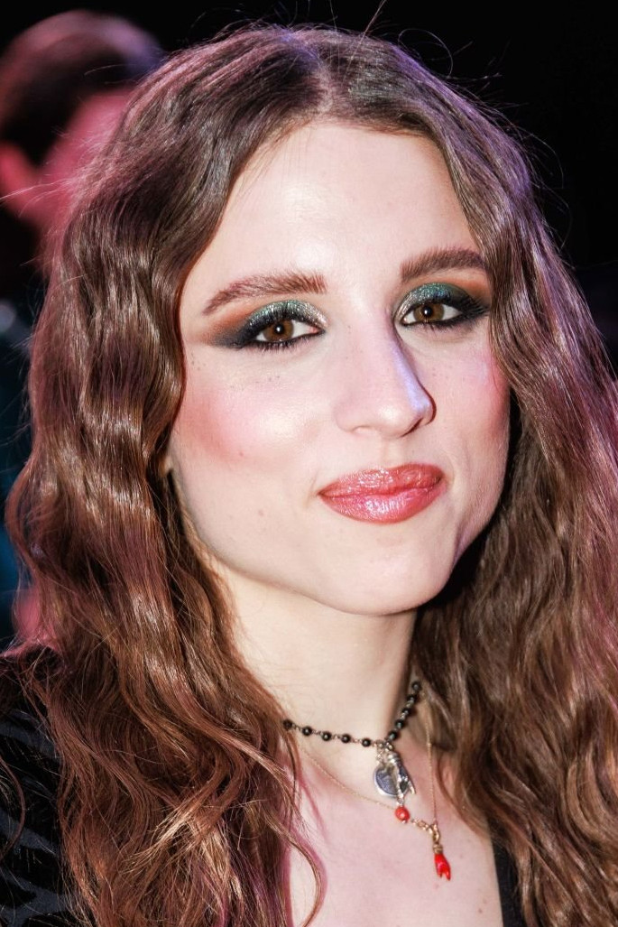 Angelina Mango backdrop