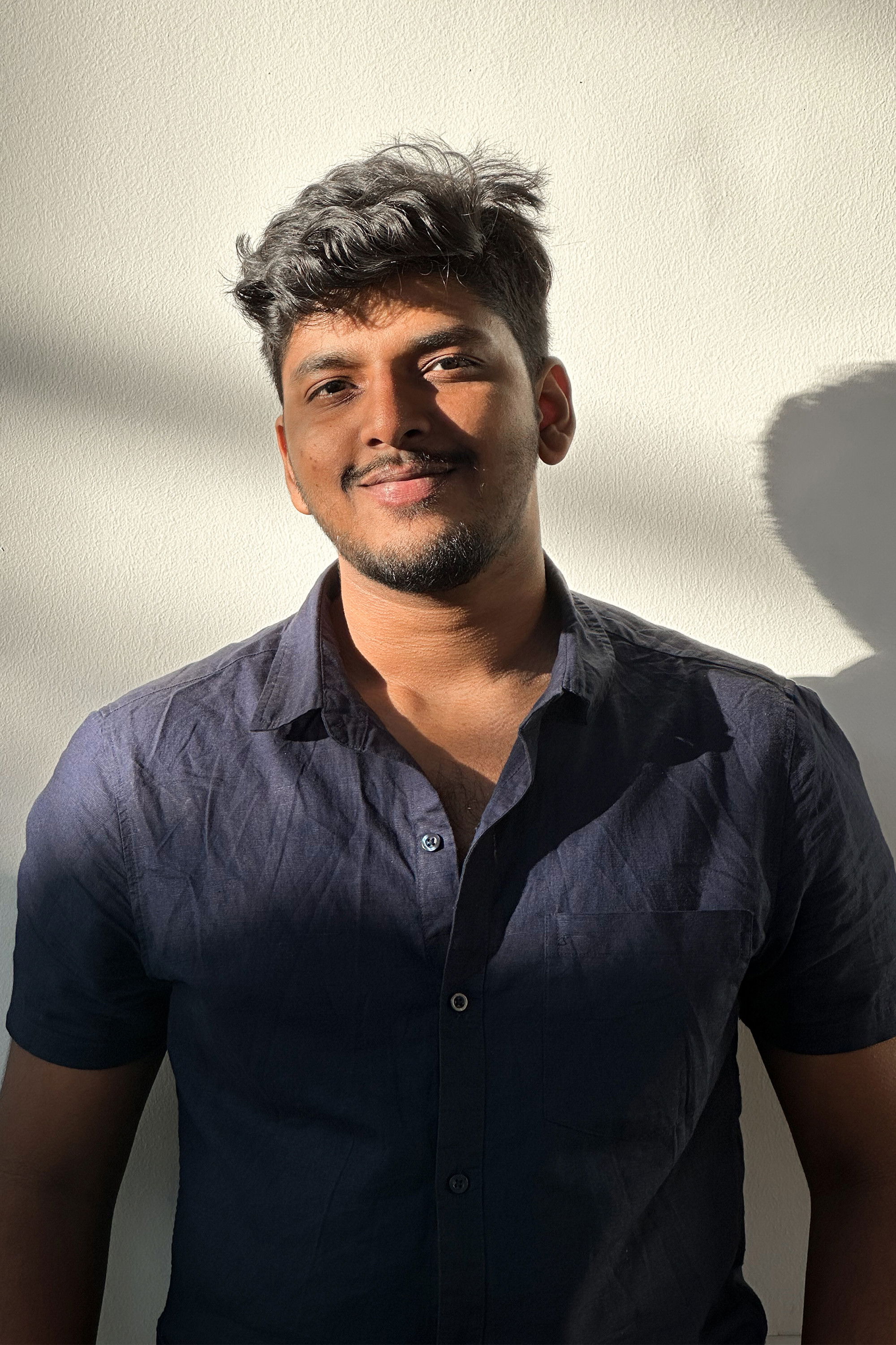 Aman Saji Dominic backdrop