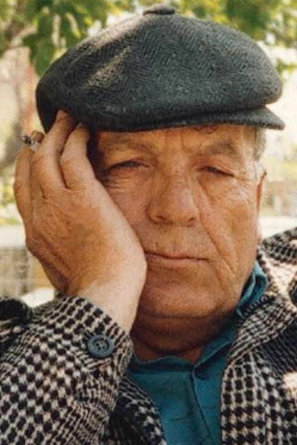 Muhammad Al-Maghut backdrop