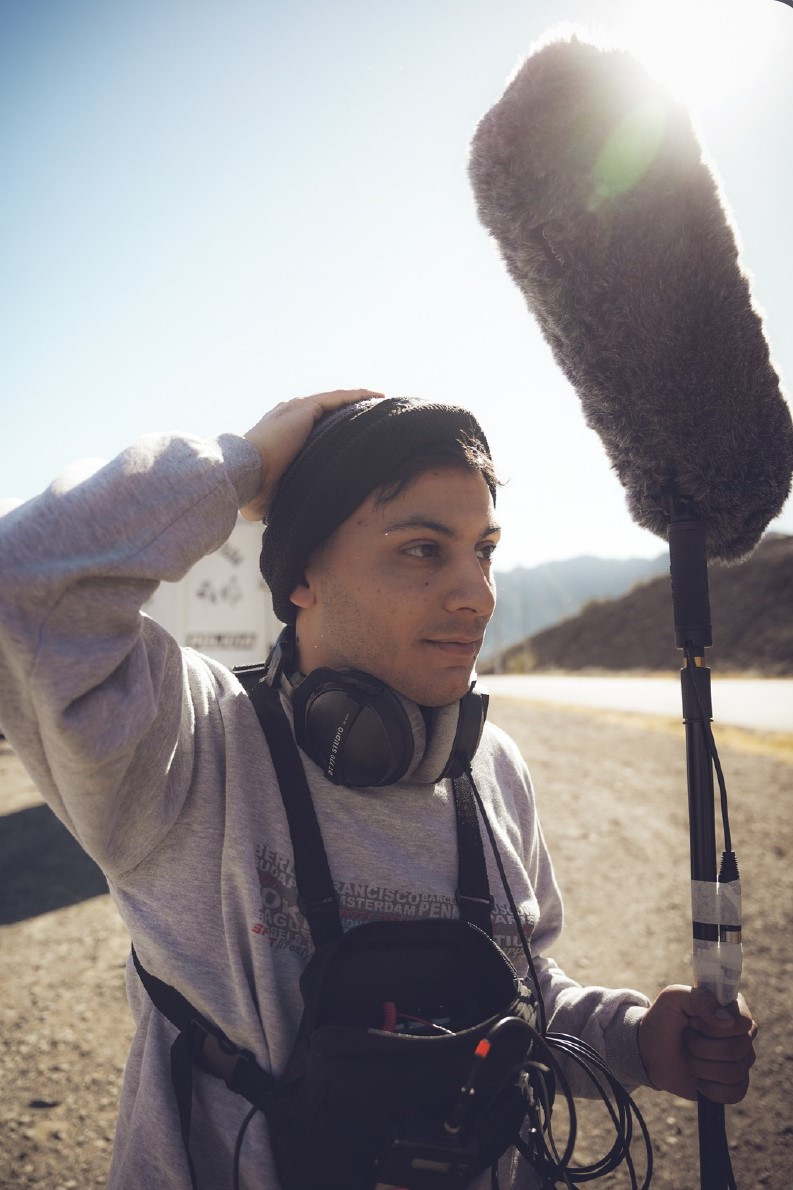 Aín Olivares backdrop