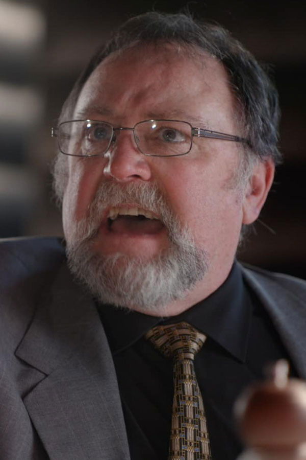 Angus MacNeil backdrop