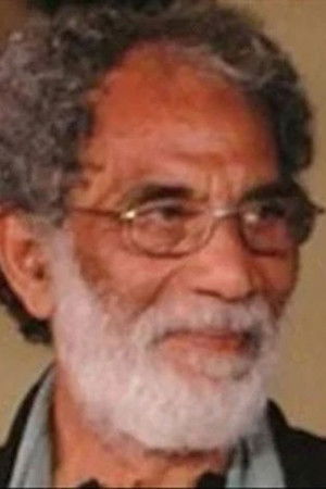 Tariq Al Mirghani backdrop