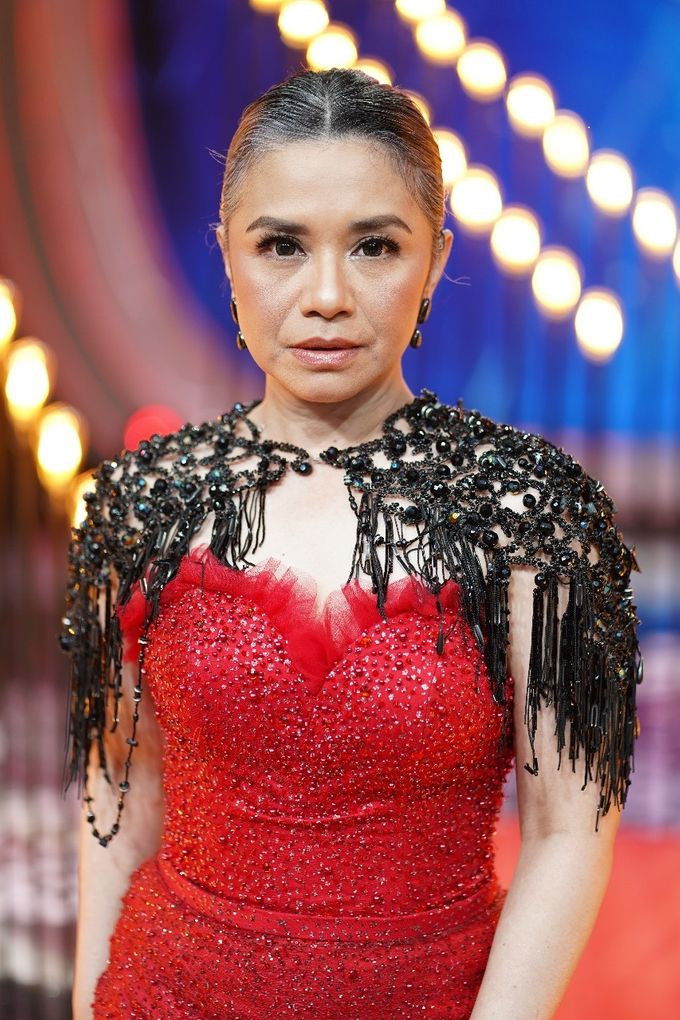 Ruth Sahanaya backdrop