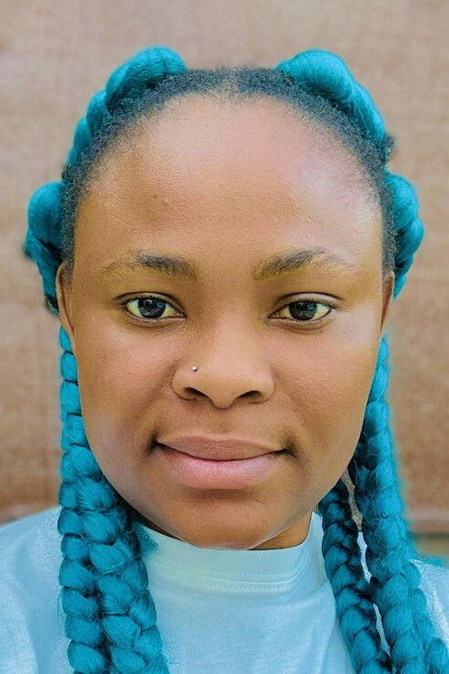 Selinna Ajamikoko backdrop