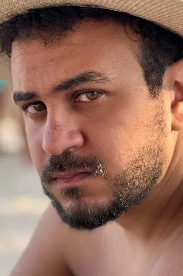 Ahmed Essam backdrop