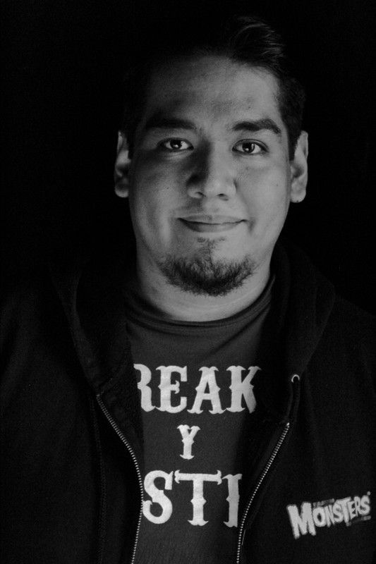 Carlos Alberto González Vega backdrop