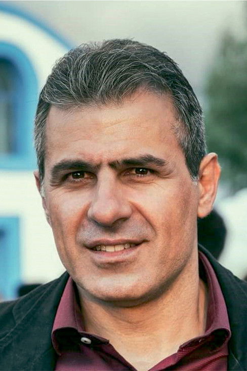 Kostas Karathomas backdrop