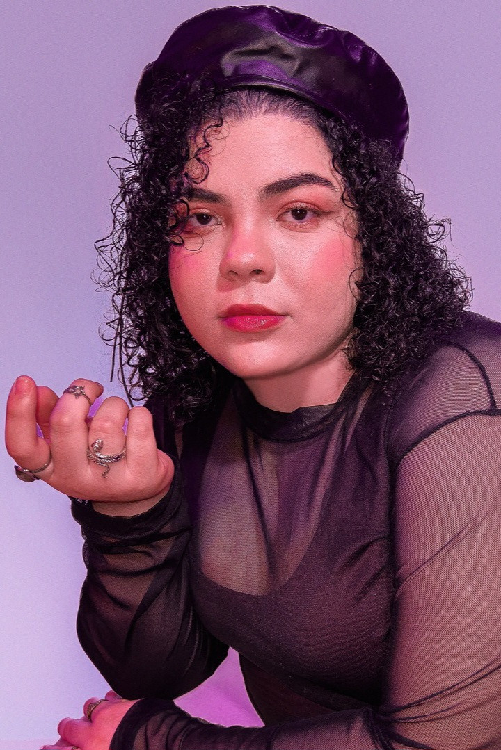 Anna Carollina Coelho backdrop