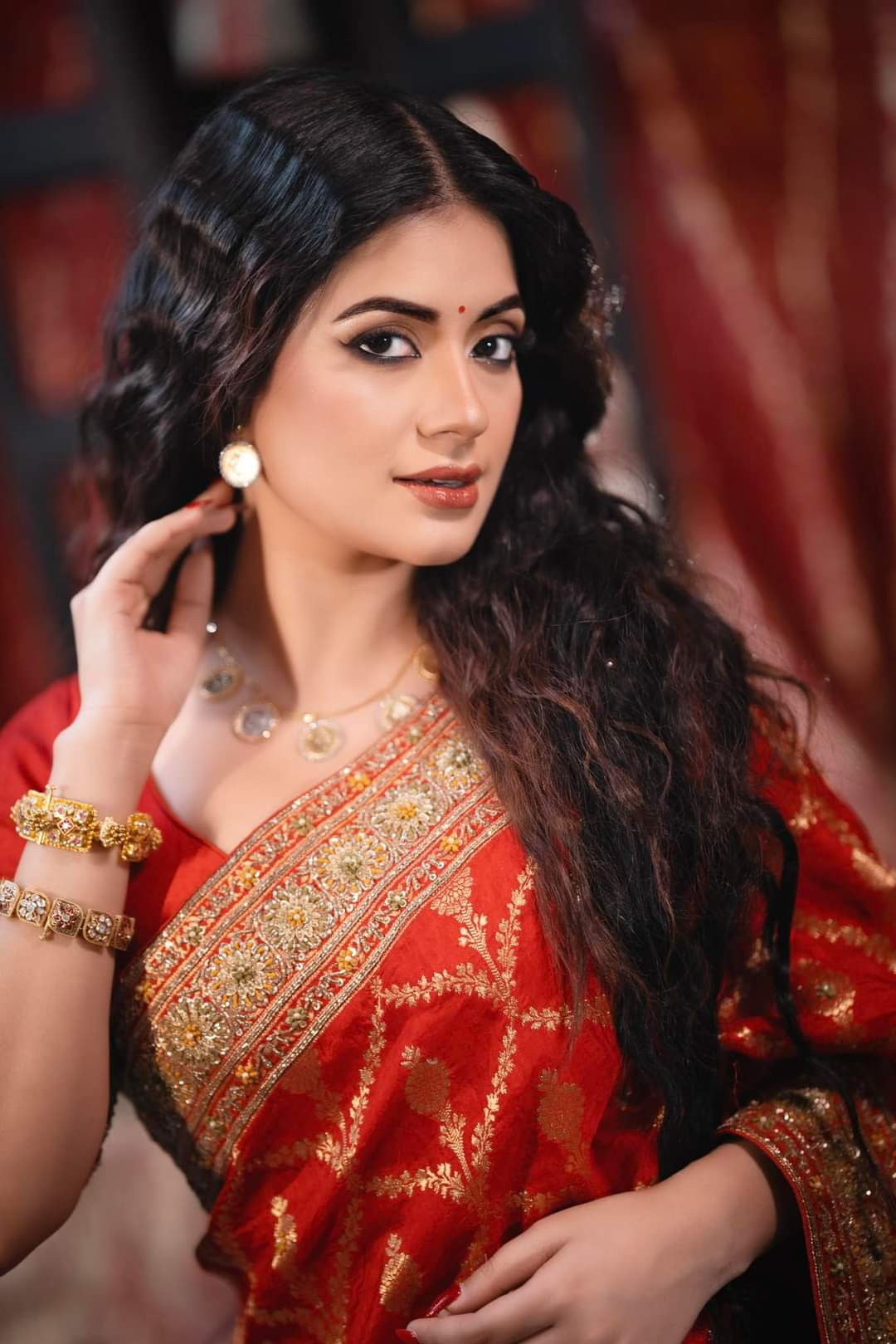 Mondira Chakroborty backdrop