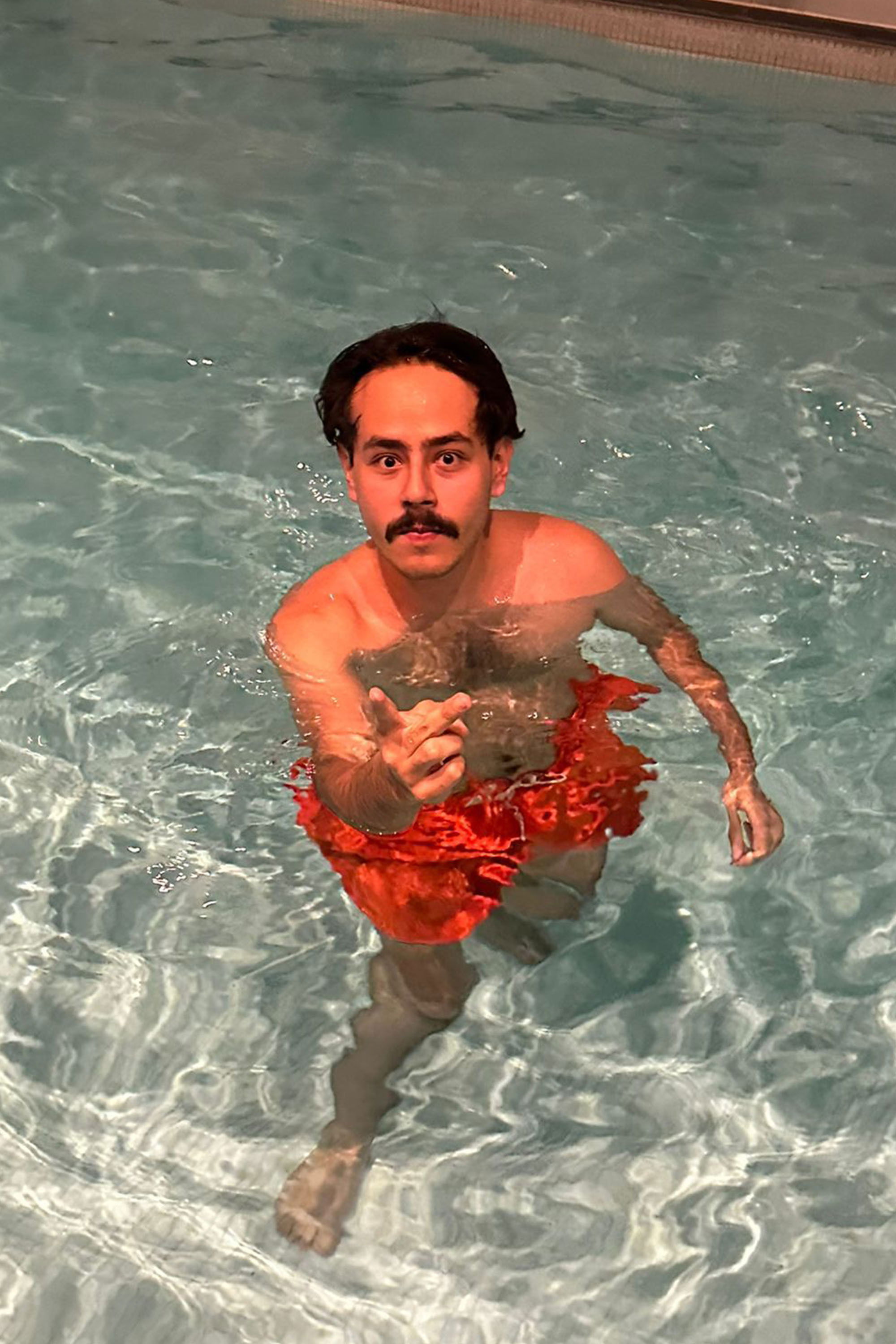 Ángel Ponce backdrop