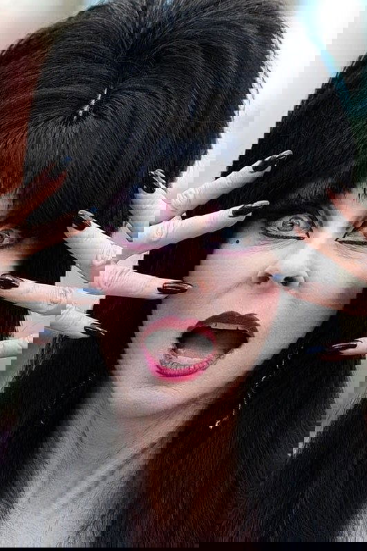 Cassandra Peterson backdrop