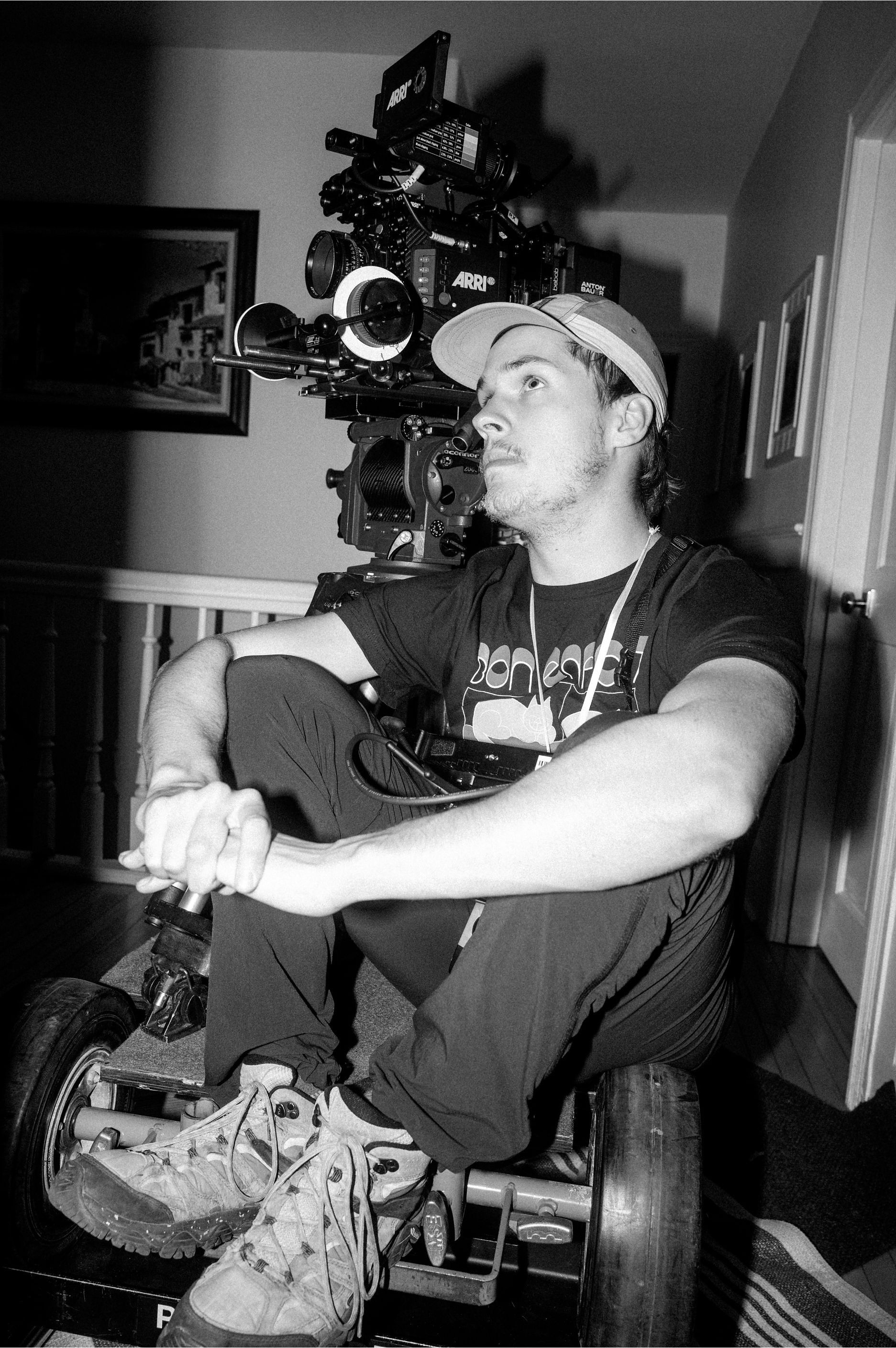 Anthony J. Caron backdrop