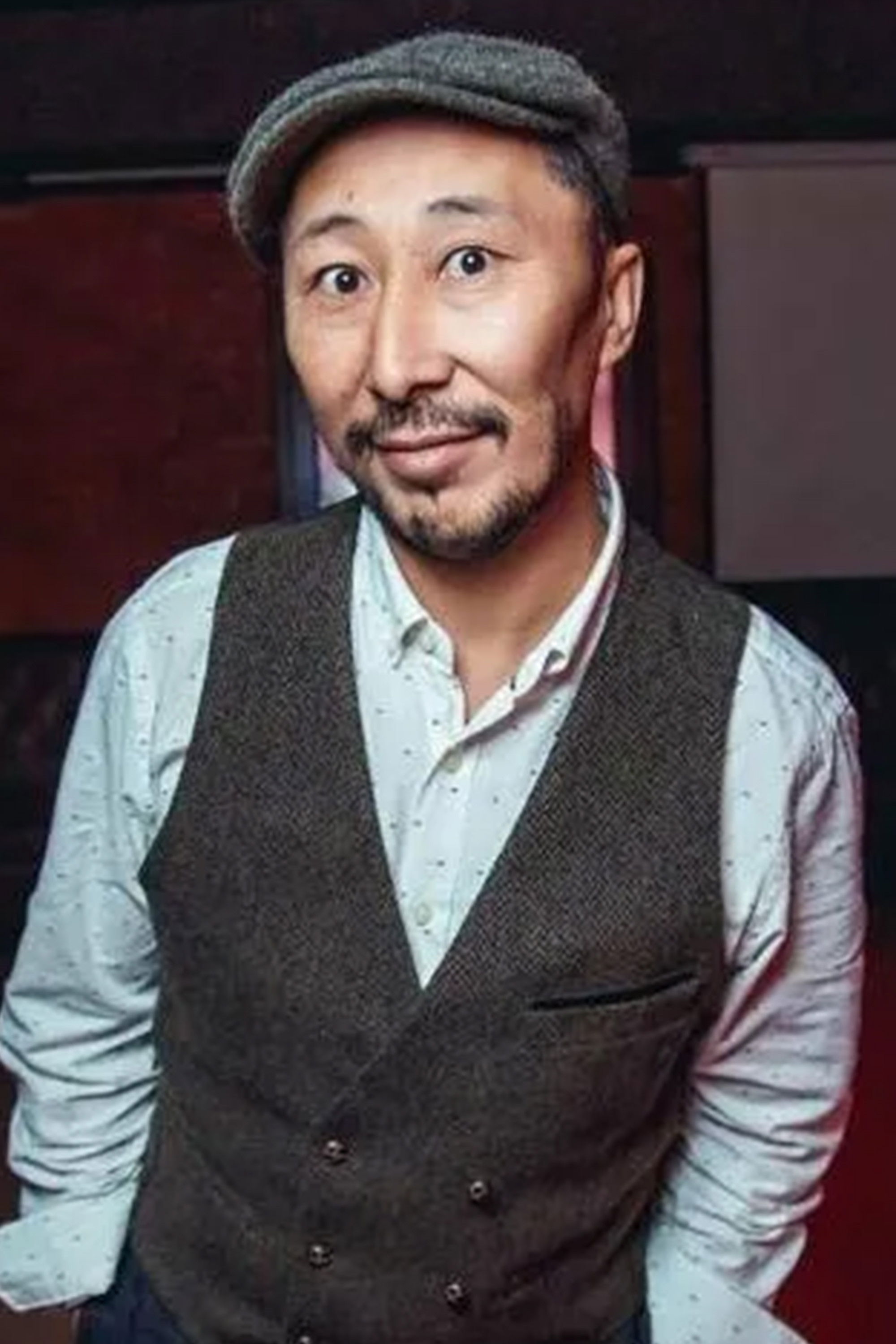 Tulepbergen Baisakalov backdrop