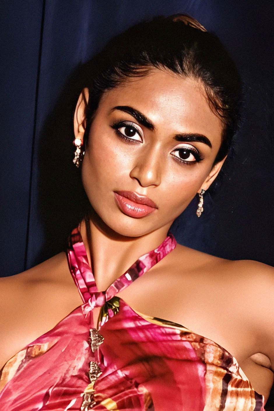 Preethy Karan backdrop