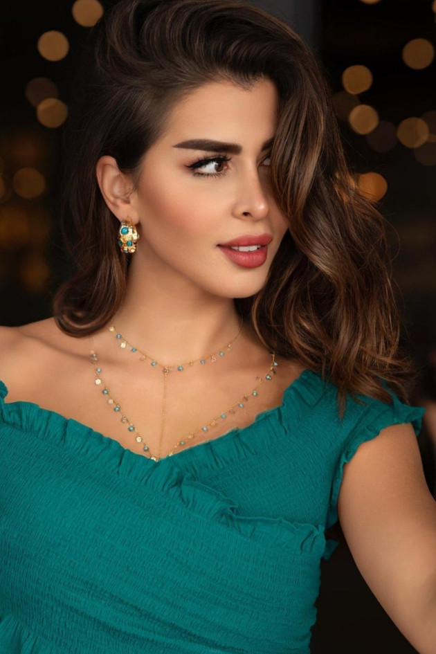 Tamila Sinan backdrop