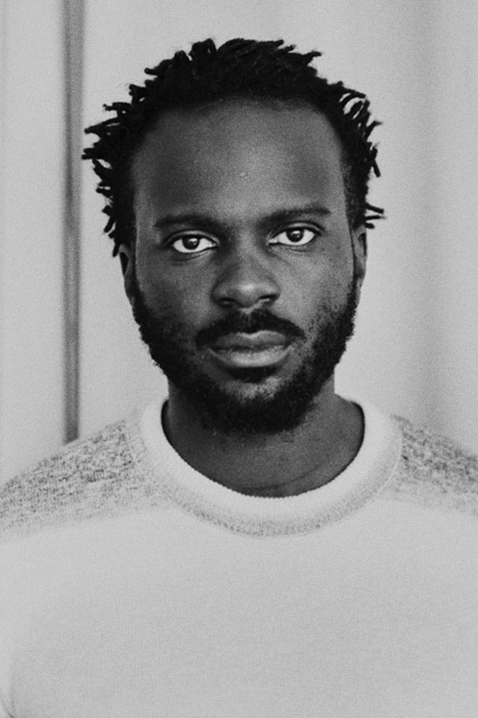 Jean-Bastien Niyigaruye backdrop