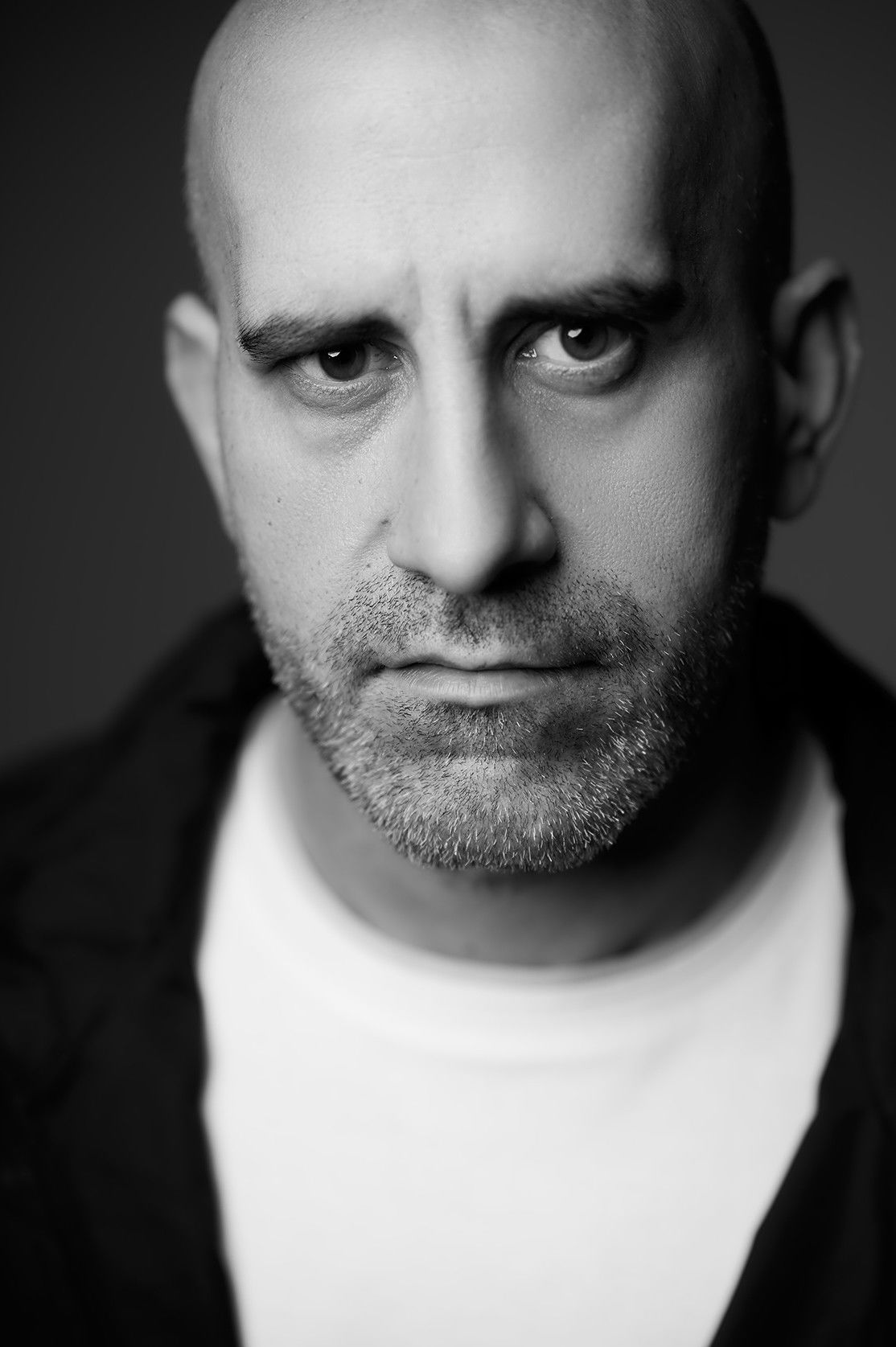 John Vizaniaris backdrop