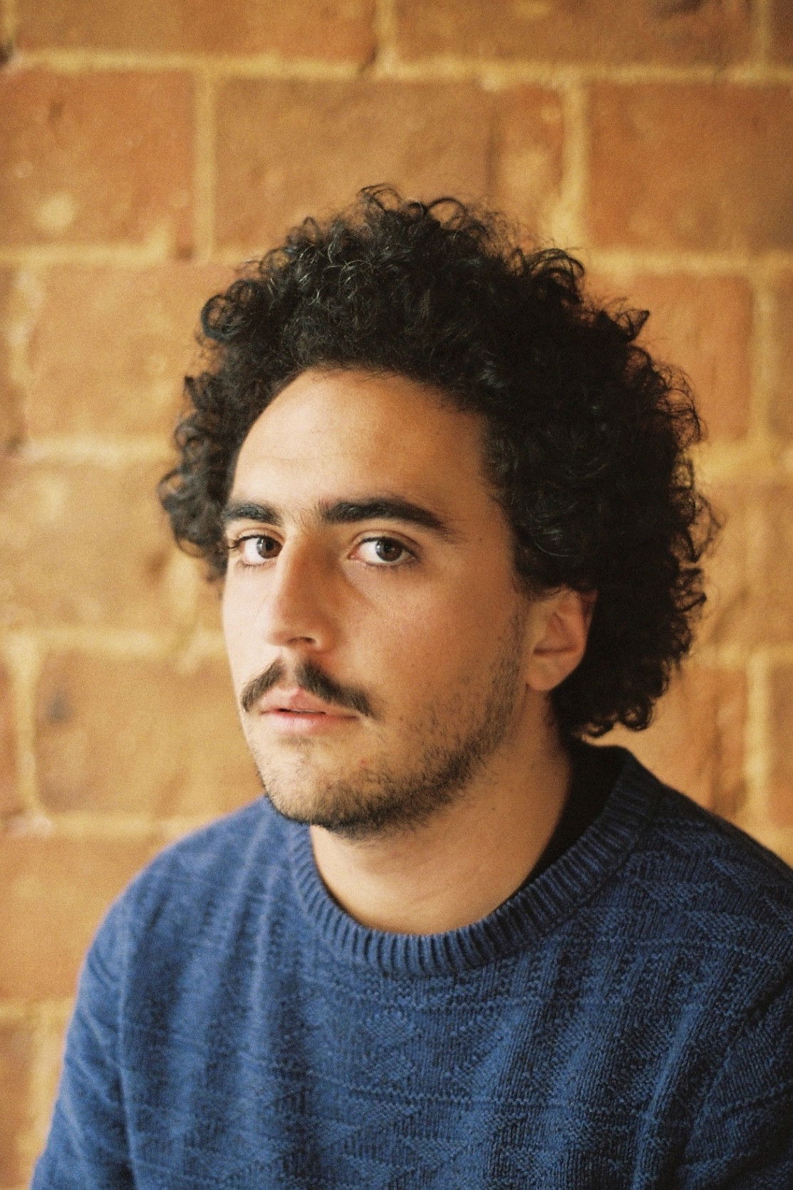 Emilio J. Freile backdrop